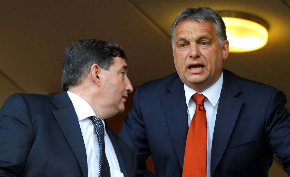 Hungarian Prime Minister Viktor Orban is seen at a football match with his childhood friend Lorinc Meszaros in Felcsut